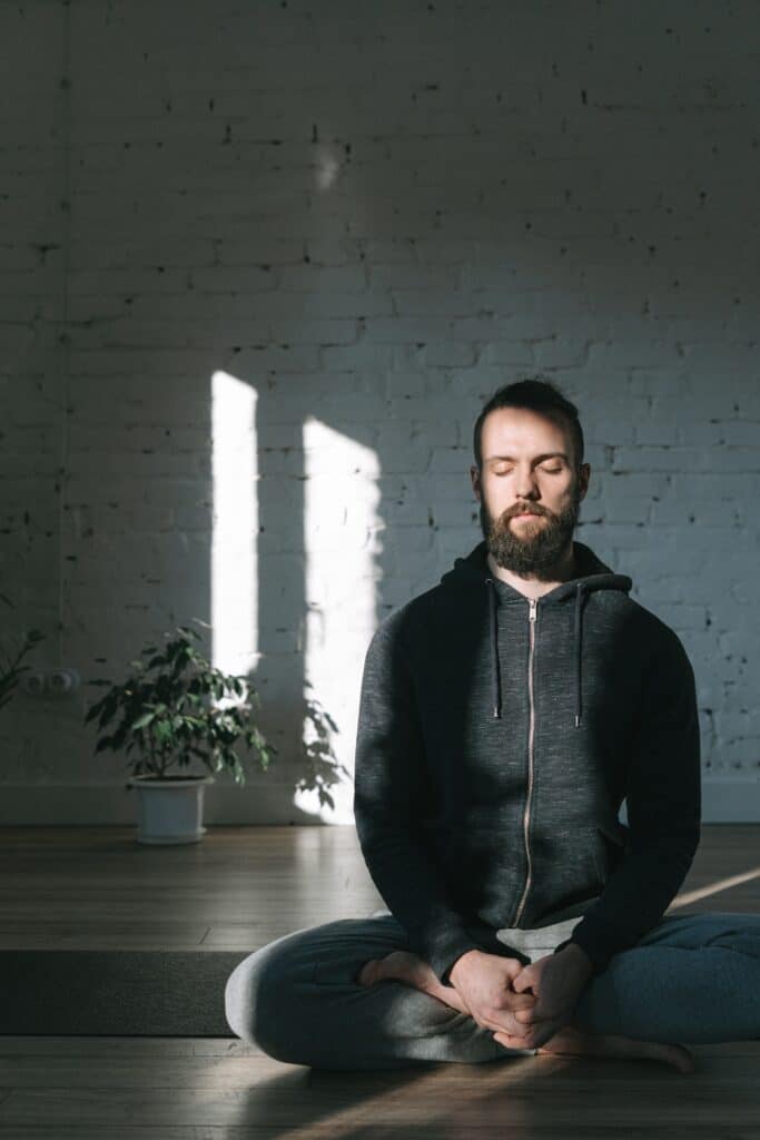 Man practicing meditation breathing